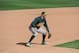 TEMPE, AZ - FEBRUARY 24: Adam Rosales #17 of the Oakland Athletics plays the field during the game against the Los Angeles Angeles of Anaheim on February 24, 2013 at Tempe Diablo Stadium in Tempe, Arizona. The Athletics defeated the Angels 7-5. (Photo by Rich Pilling/Getty Images)