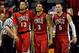 LAS VEGAS, NV - MARCH 15: (L-R) Bryce DeJean-Jones #13, Anthony Marshall #3 and Katin Reinhardt #5 of the UNLV Rebels walk up court during the second half of a semifinal game of the Reese's Mountain West Conference Basketball tournament against the Colorado State Rams at the Thomas & Mack Center on March 15, 2013 in Las Vegas, Nevada. UNLV won 75-65. (Photo by Jeff Bottari/Getty Images)