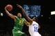 LAS VEGAS, NV - MARCH 16: Carlos Emory #33 of the Oregon Ducks goes up against Shabazz Muhammad #15 of the UCLA Bruins in the second half of the Pac-12 Championship game at MGM Grand Garden Arena on March 16, 2013 in Las Vegas, Nevada. (Photo by Jeff Gross/Getty Images)