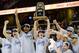 Mar 16, 2013; Cleveland, OH, USA; Members of the Akron Zips celebrate after beating the Ohio Bobcats in the championship game of the MAC tournament at Quicken Loans Arena. Akron beat Ohio 65-46. Mandatory Credit: Eric P. Mull-USA TODAY Sports