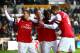 SWANSEA, WALES - MARCH 16: Gervinho of Arsenal (2ndR) celebrates his goal with Per Mertesacker and team mates during the Barclays Premier League match between Swansea City and Arsenal at Liberty Stadium on March 16, 2013 in Swansea, Wales. (Photo by Jan Kruger/Getty Images)