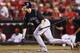 CINCINNATI, OH - MAY 25: Troy Tulowitzki #2 of the Colorado Rockies singles to drive in a run in the ninth inning against the Cincinnati Reds at Great American Ball Park on May 25, 2012 in Cincinnati, Ohio. The Rockies won 6-3. (Photo by Joe Robbins/Getty Images)