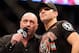 Nov 17, 2012; Montreal, QC, Canada; Patrick Cote (right) and UFC host Joe Rogan watch the replay after Alessio Sakara (not pictured) was disqualified for punches to the back of Cote's head during their Middleweight bout at UFC 154 at the Bell Centre. Cote won after Sakara was declared disqualified. Mandatory Credit: Eric Bolte-USA TODAY Sports