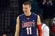 Mar 10, 2013; Conway, SC, USA; Liberty Flames forward Andrew Smith (11) reacts to a play during the championship game of the Big South Conference tournament against the Charleston Southern Buccaneers at HTC Center. Mandatory Credit: Curtis Wilson-USA TODAY Sports