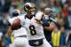 SEATTLE, WA - DECEMBER 30: Quarterback Sam Bradford #8 of the St. Louis Rams passes against the Seattle Seahawks at CenturyLink Field on December 30, 2012 in Seattle, Washington. (Photo by Otto Greule Jr/Getty Images)