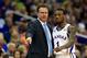 KANSAS CITY, MO - MARCH 16: Naadir Tharpe #1 of the Kansas Jayhawks talks with head coach Bill Self in the second half of the game against the Kansas State Wildcats during the Final of the Big 12 basketball tournament at Sprint Center on March 16, 2013 in Kansas City, Missouri. (Photo by Jamie Squire/Getty Images)