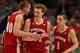 CHICAGO, IL - MARCH 16: (L-R) Jared Berggren #40, Mike Brueswitz #31, and Ben Brust #1 of the Wisconsin Badgers celebrate during a semifinal game of the Big Ten Basketball Tournament against the Indiana Hoosiers at the United Center on March 16, 2013 in Chicago, Illinois. Wisconsin defeats Indiana 68-56. (Photo by Jonathan Daniel/Getty Images)
