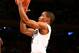 Mar 12, 2013; New York, NY, USA; Providence Friars guard Bryce Cotton (11) shoots the ball as Cincinnati Bearcats forward Jermaine Sanders (15) defends during the second half at the Big East tournament at Madison Square Garden. Mandatory Credit: Debby Wong-USA TODAY Sports