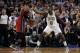 Mar 18, 2013; Boston, Massachusetts, USA; Miami Heat forward LeBron James (6) is guarded by Boston Celtics forward Jeff Green (8) during the fourth quarter at TD Banknorth Garden. The Miami Heat won 105-103. Mandatory Credit: Greg M. Cooper-USA TODAY Sports