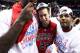 NASHVILLE, TN - MARCH 17: Marshall Henderson #22 of the Ole Miss Rebels celebrates with teammates after their 66 to 63 win over the Florida Gators in the SEC Basketball Tournament Championship game at Bridgestone Arena on March 17, 2013 in Nashville, Tennessee. (Photo by Andy Lyons/Getty Images)