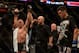 Mar 16, 2013; Montreal, Quebec, CAN; Georges St.Pierre (red) is declared the winner by unanimous decision during the Welterweight title bout against Nick Diaz at UFC 158 at the Bell Centre. Mandatory Credit: Eric Bolte-USA TODAY Sports