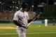DETROIT, MI - OCTOBER 16: Mark Teixeira #25 of the New York Yankees looks at his cat as he walks back to the dugout after he fouled out in the top of the fourth inning against the Detroit Tigers during game three of the American League Championship Series at Comerica Park on October 16, 2012 in Detroit, Michigan. (Photo by Jonathan Daniel/Getty Images)