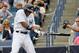 February 24, 2013; Tampa, FL, USA; New York Yankees center fielder Curtis Granderson (14) reacts after he was hit in the forearm by a pitch during the first inning against the Toronto Blue Jays at George M. Steinbrenner Field. Mandatory Credit: Kim Klement-USA TODAY Sports