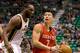 Jan 28, 2013; Salt Lake City, UT, USA; Houston Rockets point guard Jeremy Lin (7) drives to the basket around Utah Jazz center Al Jefferson (25) during the first quarter at EnergySolutions Arena. Mandatory Credit: Russ Isabella-USA TODAY Sports