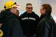 DAYTONA BEACH, FL - FEBRUARY 13: MMA fighter Brock Lesnar(C) speaks with Kevin Harvick(L), driver of the #29 Shell/Pennzoil Chevrolet, and team owner Richard Childress during practice for the Daytona 500 at Daytona International Speedway on February 13, 2010 in Daytona Beach, Florida. (Photo by Jason Smith/Getty Images for NASCAR)