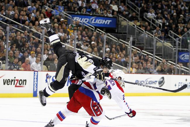 Brooks Laich send Sidney Crosby tumbling