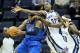 Feb 27, 2013; Memphis, TN, USA; Memphis Grizzlies forwards Ed Davis (32) and Zach Randolph (50) defend against Dallas Mavericks guard Vince Carter (25) at the FedEx Forum. Mandatory Credit: Nelson Chenault-USA TODAY Sports