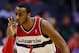 WASHINGTON, DC - MARCH 15: John Wall #2 of the Washington Wizards celebrates after hitting a three pointer against the New Orleans Hornets during the first half at Verizon Center on March 15, 2013 in Washington, DC. NOTE TO USER: User expressly acknowledges and agrees that, by downloading and or using this photograph, User is consenting to the terms and conditions of the Getty Images License Agreement. (Photo by Rob Carr/Getty Images)