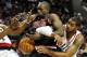Nov.. 18, 2011; Portland, OR, USA; Chicago Bulls small forward Luol Deng (9) and Portland Trail Blazers power forward LaMarcus Aldridge (12) battle for a loose ball during the fourth quarter of the game at the Rose Garden. The Blazers won the game 102-94. Mandatory Credit: Steve Dykes-USA TODAY Sports