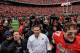 COLUMBUS, OH - NOVEMBER 24: Head Coach Urban Meyer of the Ohio State Buckeyes is surrounded by media after the Ohio State defeated the Michigan Wolverines 26-21at Ohio Stadium on November 24, 2012 in Columbus, Ohio. (Photo by Jamie Sabau/Getty Images)