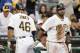 PITTSBURGH, PA - JULY 5: Garrett Jones #46 of the Pittsburgh Pirates celebrates with Pedro Alvarez #24 after hitting a sacrifice fly in the third inning against the Houston Astros during the game on July 5, 2012 at PNC Park in Pittsburgh, Pennsylvania. (Photo by Justin K. Aller/Getty Images)
