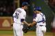 ARLINGTON, TX - AUGUST 2: Geovany Soto #8 of the Texas Rangers congratulates closing pitcher Joe Nathan $36 of the Texas Rangers after a win over the Los Angeles Angels of Anaheim at Rangers Ballpark in Arlington on August 2, 2012 in Arlington, Texas. (Photo by Rick Yeatts/Getty Images)