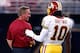 ST LOUIS, MO - SEPTEMBER 16: Head coach Mike Shanahan talks with quarterback Robert Griffin III #10 of the Washington Redskins prior to the start of the game against the St. Louis Rams at Edward Jones Dome on September 16, 2012 in St Louis, Missouri. (Photo by Jamie Squire/Getty Images)