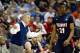 COLUMBUS, OH - MARCH 16: Head coach Rick Byrd of the Belmont Bruins reacts as player Ian Clark #21 looks on during the first half against the Georgetown Hoyas during the second round of the 2012 NCAA Men's Basketball Tournament at Nationwide Arena on March 16, 2012 in Columbus, Ohio. (Photo by Rob Carr/Getty Images)