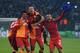 GELSENKIRCHEN, GERMANY - MARCH 12: Wesley Sneijder and Didier Drogba of Galatasaray celebrate with team mates Goekhan Zan and Felipe Melo after winning the UEFA Champions League round of 16 second leg match between FC Schalke 04 and Galatasaray AS at Veltins-Arena on March 12, 2013 in Gelsenkirchen, Germany. (Photo by Lars Baron/Getty Images)