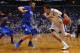 ST. LOUIS, MO - MARCH 9: Doug McDermott #3 of the Creighton Bluejays drive to the basket against Justin Gant #5 of the Indiana State Sycamores during the semifinals of the Missouri Valley Conference Tournament at the Scottrade Center on March 9, 2013 in St. Louis, Missouri. (Photo by Dilip Vishwanat/Getty Images)