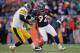 DENVER, CO - JANUARY 08: Ben Roethlisberger #7 of the Pittsburgh Steelers loses the ball against Elvis Dumervil #92 of the Denver Broncos during the AFC Wild Card Playoff game at Sports Authority Field at Mile High on January 8, 2012 in Denver, Colorado. (Photo by Doug Pensinger/Getty Images)