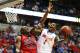 NASHVILLE, TN - MARCH 17: Kenny Boynton #1 of the Florida Gators goes up against Reginald Buckner #23 of the Ole Miss Rebels in the second half of the SEC Basketball Tournament Championship game at Bridgestone Arena on March 17, 2013 in Nashville, Tennessee. (Photo by Andy Lyons/Getty Images)