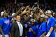 KANSAS CITY, MO - MARCH 16: The Kansas Jayhawks and head coach Bill Self celebrate with the trophy after their 70-54 win over the Kansas State Wildcats during the Final of the Big 12 basketball tournament at Sprint Center on March 16, 2013 in Kansas City, Missouri. (Photo by Jamie Squire/Getty Images)