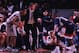 20 Feb 1996: UConn coach Jim Calhoun shouts instructions from the sideline as the Allen Iverson prepares to contest Ricky Moore, #21 right, of Georgetown as the Hoyas defeat the Huskies by 77-65 at the U.S. Air Arena in Landover, Maryland.
