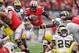 COLUMBUS, OH - NOVEMBER 24: Quarterback Braxton Miller #5 of the Ohio State Buckeyes controls the ball against the Michigan Wolverines at Ohio Stadium on November 24, 2012 in Columbus, Ohio. (Photo by Jamie Sabau/Getty Images)