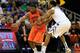 KANSAS CITY, MO - MARCH 15: Marcus Smart #33 of the Oklahoma State Cowboys controls the ball against Shane Southwell #1 of the Kansas State Wildcats in the first half during the Semifinals of the Big 12 basketball tournament at the Sprint Center on March 15, 2013 in Kansas City, Missouri. (Photo by Jamie Squire/Getty Images)