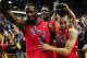 Mar 17, 2013; Nashville, TN, USA; Mississippi Rebels guard Marshall Henderson (22) and forward Murphy Holloway (31) celebrate after the Rebels defeated the Florida Gators during the championship game of the SEC tournament at Bridgestone Arena. The Rebels beat the Gators 66-63. Mandatory Credit: Don McPeak-USA TODAY Sports