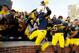 ANN ARBOR, MI - NOVEMBER 17: Brandin Hawthorne #7 of the Michigan Wolverines celebrates a 42-17 win over the Iowa Hawkeyes with fans at Michigan Stadium on November 17, 2012 in Ann Arbor, Michigan. (Photo by Gregory Shamus/Getty Images)