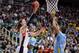 SALT LAKE CITY, UT - MARCH 21: Kelly Olynyk #13 of the Gonzaga Bulldogs shoots over Malcolm Miller #33 of the Southern University Jaguars in the first half during the second round of the 2013 NCAA Men's Basketball Tournament at EnergySolutions Arena on March 21, 2013 in Salt Lake City, Utah. (Photo by Harry How/Getty Images)