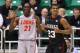 SALT LAKE CITY, UT - MARCH 21: Wesley Saunders #23 of the Harvard Crimson reacts in the second half alongside Tony Snell #21 of the New Mexico Lobos during the second round of the 2013 NCAA Men's Basketball Tournament at EnergySolutions Arena on March 21, 2013 in Salt Lake City, Utah. (Photo by Streeter Lecka/Getty Images)