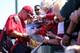 TEMPE, AZ - FEBRUARY 27: Mike Trout #27 of the Los Angeles Angels signs autographs for fans before the spring training game against the San Francisco Giants at Tempe Diablo Stadium on February 27, 2013 in Tempe, Arizona. (Photo by Christian Petersen/Getty Images)