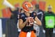 Dec 29, 2012; Bronx, NY, USA; Syracuse Orange quarterback Ryan Nassib (12) drops back to pass during the first quarter against the West Virginia Mountaineers at the 2012 New Era Pinstripe Bowl at Yankee Stadium. Syracuse defeated West Virginia 38-14. Mandatory Credit: Rich Barnes-USA TODAY Sports