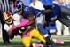 EAST RUTHERFORD, NJ - OCTOBER 21: Defensive end Osi Umenyiora #72 of the New York Giants sacks quarterback Robert Griffin III #10 of the Washington Redskins during their game at MetLife Stadium on October 21, 2012 in East Rutherford, New Jersey. (Photo by Alex Trautwig/Getty Images)