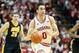 Will Sheehey driving down the court against the Iowa Hawkeyes