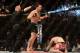 Mar 16, 2013; Montreal, Quebec, CAN; Jake Ellenberger (red) celebrates after defeating Nate Marquardt (blue) in their main card bout at UFC 158 at the Bell Centre. Mandatory Credit: Eric Bolte-USA TODAY Sports