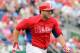 March 22, 2013; Clearwater, FL, USA; Philadelphia Phillies left fielder Darin Ruf (18) singles during the second inning against the Atlanta Braves at Bright House Networks Field. Mandatory Credit: Kim Klement-USA TODAY Sports