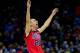 KANSAS CITY, MO - MARCH 22: Marshall Henderson #22 of the Ole Miss Rebels celebrates their 57-46 win over the Wisconsin Badgers during the second round of the 2013 NCAA Men's Basketball Tournament at the Sprint Center on March 22, 2013 in Kansas City, Missouri. (Photo by Jamie Squire/Getty Images)