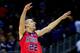KANSAS CITY, MO - MARCH 22: Marshall Henderson #22 of the Ole Miss Rebels celebrates their 57-46 win over the Wisconsin Badgers during the second round of the 2013 NCAA Men's Basketball Tournament at the Sprint Center on March 22, 2013 in Kansas City, Missouri. (Photo by Jamie Squire/Getty Images)