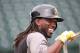 BRADENTON, FL - FEBRUARY 25: Andrew McCutchen #22 of the Pitsburgh Pirates takes a break during batting practice prior to the start of the game against the Philadelphia Phillies at McKechnie Field on February 25, 2013 in Bradenton, Florida. (Photo by Leon Halip/Getty Images)