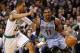 Jan 2, 2013; Boston, MA, USA; Memphis Grizzlies point guard Mike Conley (11) drives to the hoop against Boston Celtics shooting guard Courtney Lee (11) during the first half at TD Garden. Mandatory Credit: Mark L. Baer-USA TODAY Sports